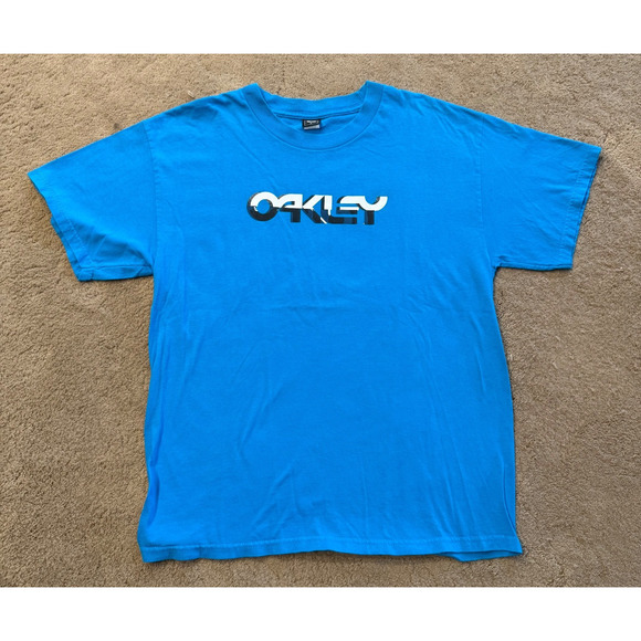 Vintage Oakley Tee Mens Blue with black White Logo Size Large EUC - Picture 1 of 7